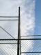Clouds and Fence Pole